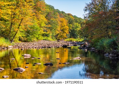 Morning Sunrise At Tea Creek Campground With Shallow River Water Landscape In Colorful Autumn Fall Foliage Forest Trees And Rocks In Marlinton, West Virginia