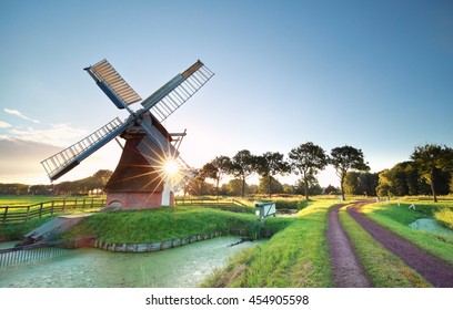 Morning Sunshine Behind Dutch Windmill, Holland