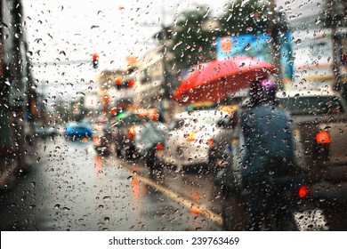 Morning traffic ,view through the window on rainy day