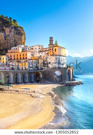 Morning view of Amalfi cityscape on coast line of mediterranean sea, Italy
