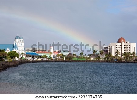 The morning view of Apia downtown and a sky with a rainbow (Samoa).