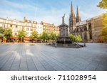 Morning view on the Victory square with monument and cathedral in Clermont-Ferrand city in France