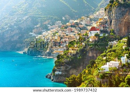 Morning view of Positano cityscape on coast line of mediterranean sea, Italy