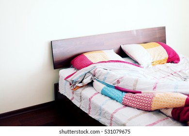 Morning View Of An Unmade Bed With Crumpled Bed Linens And No People