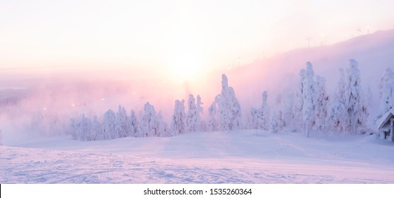 Morning in winter, a lot of snow on the trees and snowdrifts. Mountain in Lapland and the sun's rays. - Shutterstock ID 1535260364