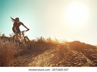 Morning, woman and mountain bike with fitness, training and extreme sport on hill and dirt path. Bicycle, cycling and cardio of athlete with nature and exercise for race workout outdoor with mockup - Powered by Shutterstock