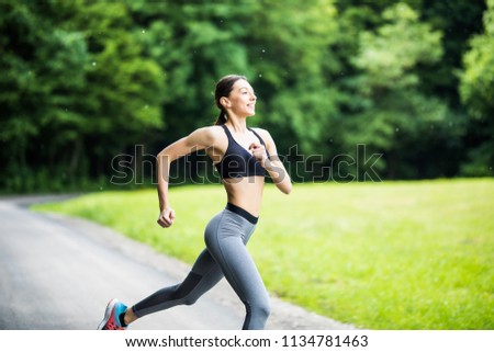 Similar – Image, Stock Photo Happy woman jogging with her smartphone