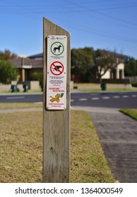 Mornington, VIC / Australia - Apr 4 2019: Dogs Must Be On Leash And Pick Up Dog Poo Sign