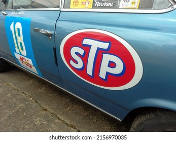 MORO, ARGENTINA - Mar 27, 2022: Old Sponsorship Advertisement Sign Logo On The Side Of A Racing Car  STP Is A Brand Of Automotive Performance Lubricants, Motor Oil, Additives