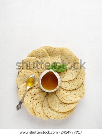 Moroccan breakfast with Baghrir, copy space