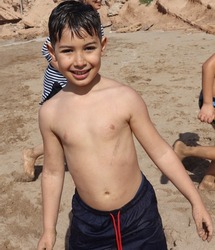 backlight of a kid on the beach, a Holiday Photo by Click and Photo