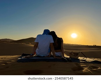 Moroccan Desert Couple Sunset Sand Dunes - Powered by Shutterstock