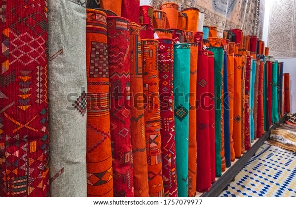 Moroccan handmade carpet at a shop in Medina of\
Fez, Morocco.