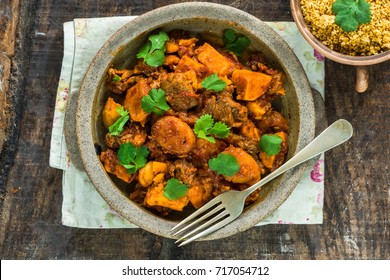 الطبخ المغربي الطحين المغربي Moroccan-lamb-tajine-couscous-garnished-260nw-717054712