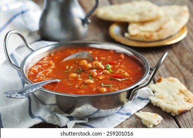 Moroccan soup with chickpeas. Selective focus on soup in bowl