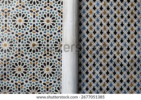 Moroccan Zellige Tile Pattern - A close-up view of traditional Moroccan zellige mosaic tiles, showcasing intricate geometric patterns and vibrant colors.