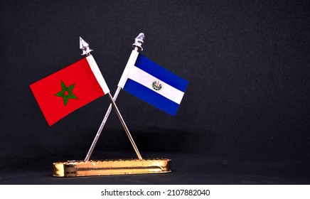 Morocco and El Salvador table flag with black Background