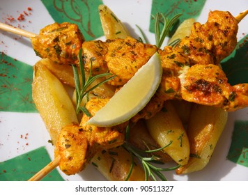 Morocco Marrakesh Traditional Grilled Chicken Kebab On A Skewer With Rosemary Saffron Paprika And Lemon On A Typical Moroccan Plate