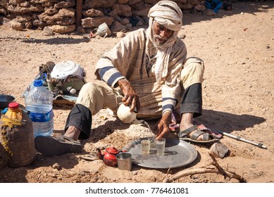 Morocco, Merzouga. 11 March 2014, Berber Man Prepares Tea In Sahara Desert