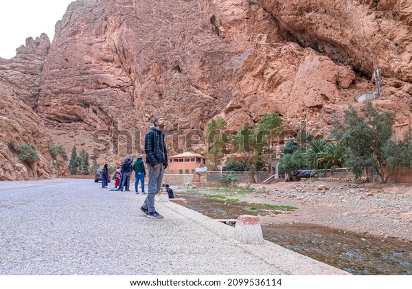 Morocco. October 10, 2021. Tourists standing at\
roadside admiring nature on\
holidays