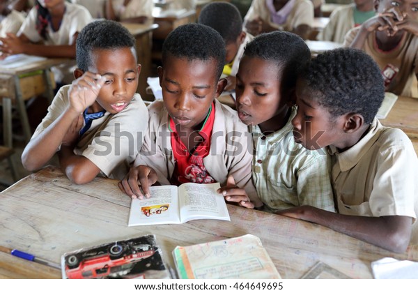 MORONDAVA - MADAGASCAR - JUNE 1, 2016: Unidentified\
students in primary school on June 1, 2016 in Morondava,\
Madagascar. Due to political crisis Madagascar is among the poorest\
countries in the\
world