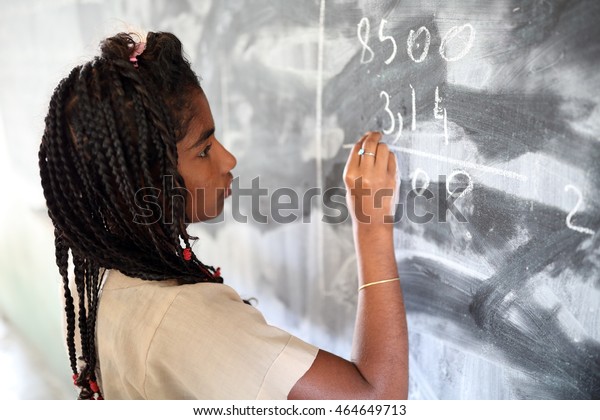 MORONDAVA - MADAGASCAR - JUNE 1, 2016: Unidentified\
student in primary school on June 1, 2016 in Morondava, Madagascar.\
Due to a political crisis Madagascar is among the poorest countries\
in the world