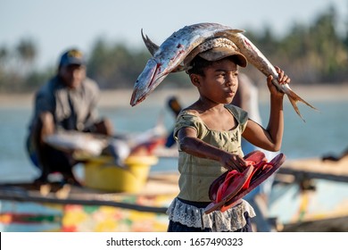 Morondava, Madagascar - October 1, 2019: People And Their Work In Morondava Harbour. Fishermen