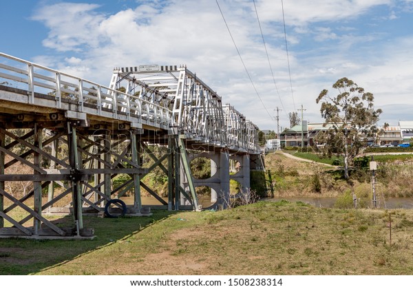 Morpeth, NSW, Australia -\
Sept 18, 2019: Bridge over the Hunter river in Morpeth, an historic\
little village on the banks of the Hunter River in the Hunter\
Valley.