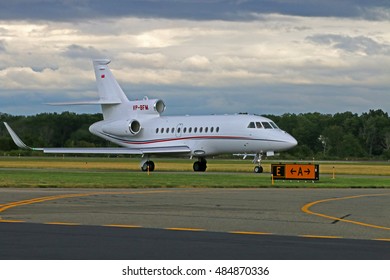 MORRISTOWN, NEW JERSEY - SEPTEMBER 6, 2016: A 2014 Dassault Falcon 900LX With Marking VP-BFM Taxiing Toward The Runway To Take Off From Morristown Municipal Airport In New Jersey.