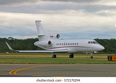 MORRISTOWN, NEW JERSEY - SEPTEMBER 6, 2016: A 2008 Dassault Falcon 900EX With Marking N5MV Taxiing Toward The Runway To Take Off From Morristown Municipal Airport In New Jersey.