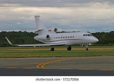 MORRISTOWN, NEW JERSEY - SEPTEMBER 6, 2016: A 2008 Dassault Falcon 900EX With Marking N5MV Taxiing Toward The Runway To Take Off From Morristown Municipal Airport In New Jersey.