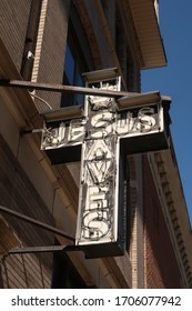 MORRISTOWN, NJ/USA - March 26, 2020: "Jesus Saves" cross on Market Street in Morristown, NJ 07960. Editorial use only.