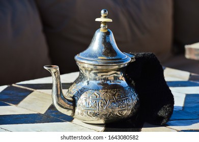 Morrocan Green Tea In Glass A Traditional Jug With Mint In Marrakech