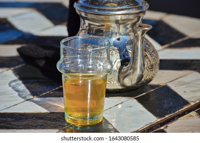 Morrocan Green Tea In Glass A Traditional Jug With Mint In Marrakech