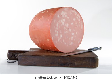 Mortadella Bologna On Rustic Cutting Board