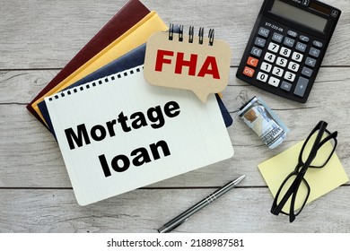 Mortage FHA Loan, Three Notepads With Text On Wooden Background