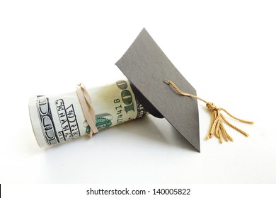 Mortar Board Grad Cap And Money Roll