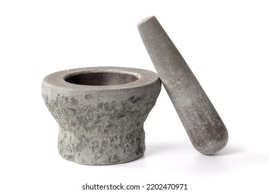 Mortar and Pestle isolated on white background.mortar is a tool for finely grinding herbs in Asian cuisine.handmade stone mortar.Old stone mortar that has been used for a long time.
