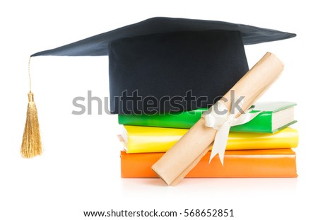 A mortarboard and graduation scroll, tied with red ribbon, on a stack of books

