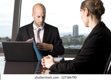 Mortgage Banker Deciding Credit