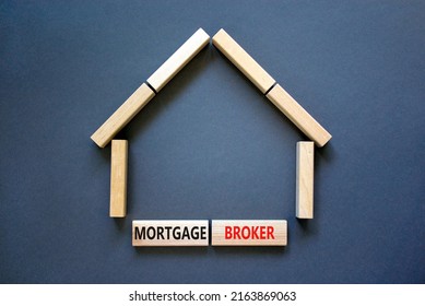 Mortgage Broker Symbol. Concept Words 'Mortgage Broker' On Wooden Blocks Near Miniature Wooden House. Beautiful Grey Background. Business, Mortgage Broker Concept.