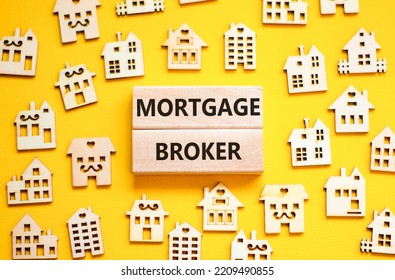 Mortgage Broker Symbol. Concept Words 'Mortgage Broker' On Wooden Blocks Near Miniature Wooden Houses. Beautiful Yellow Background. Business, Mortgage Broker Concept.