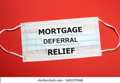 Mortgage Deferral Relief Writing On A Mask. Many Banks Worldwide Announced Mortgage And Payments Relief Because Of Coronavirus Covid 19 For People Who Cannot Make Their Payments In Time.