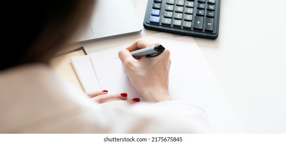 Mortgage House Credit Accountant Consulting Woman Calculating Risks. Money Female Manager Portrait Photo With Laptop, Pen, Making Marks. View From Behind