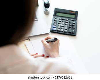 Mortgage House Credit Accountant Consulting Woman Calculating Risks. Money Female Manager Portrait Photo With Laptop, Pen, Making Marks.