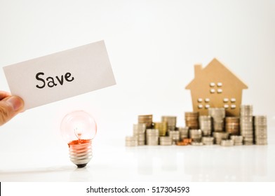 Mortgage loading and property document concept for real estate. Bulbs for lamps - idea Home finances, building savings and realty financing (investments) concept.