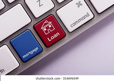Mortgage loan button on white computer keyboard
