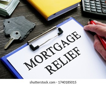 Mortgage Relief Application And Key From Home.