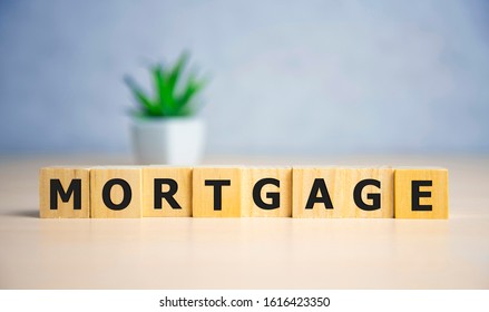 MORTGAGE word concept on wodden blocks, business concept - Shutterstock ID 1616423350