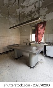 Mortuary Slab In Old Abandoned Spooky Hospital Morgue 